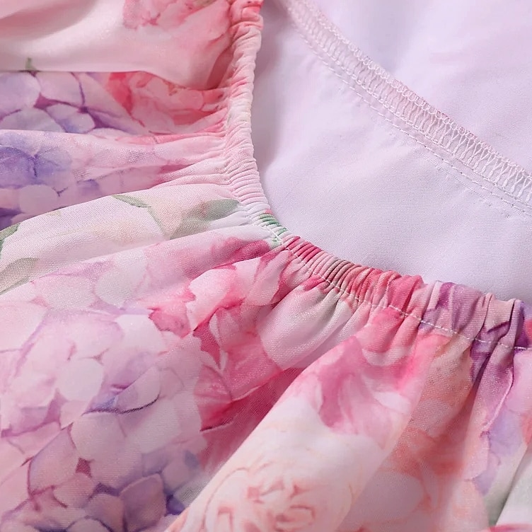 Chic Floral Printed Mini Dress Backless Sleeveless Hem — interior detail