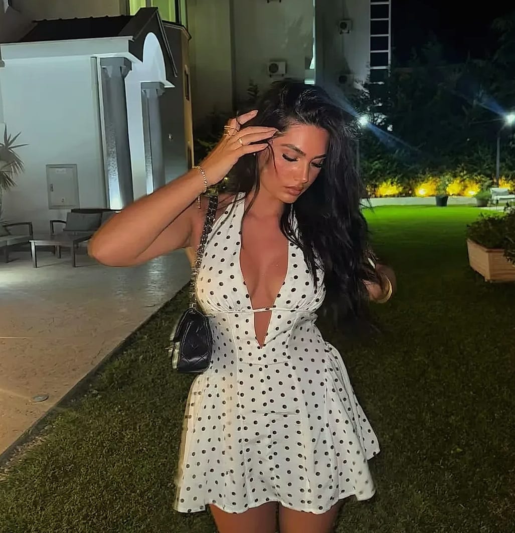 Yenkye French Style Polka Dot Halter Mini Dress — scale reference